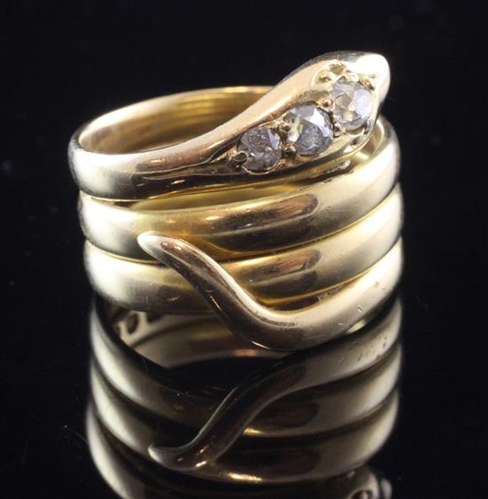 An 18ct gold and diamond serpent ring, size Q/R